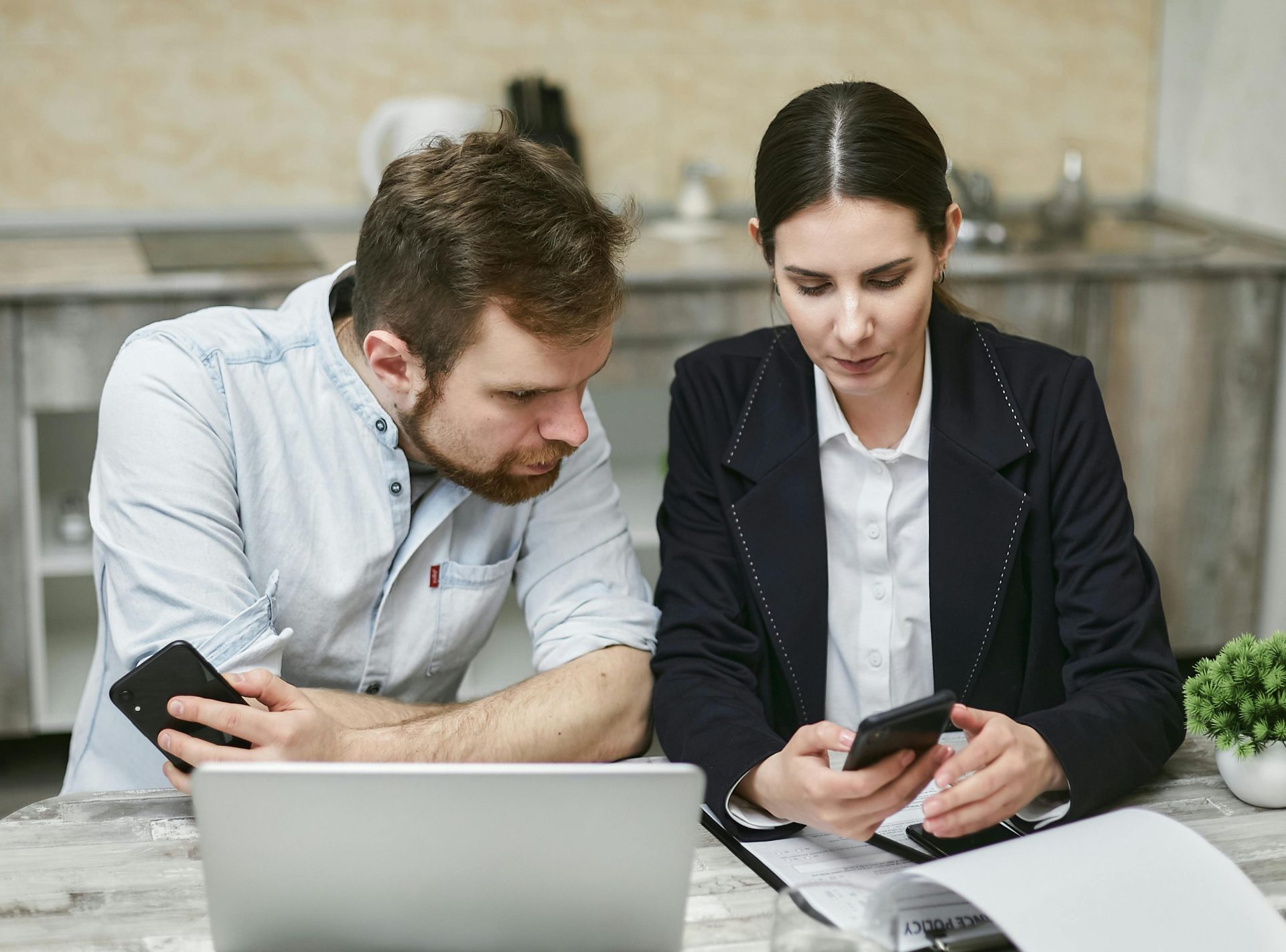 Man and Woman Using a Smartphone